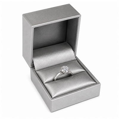 Metallic silver leatherette ring box with ring