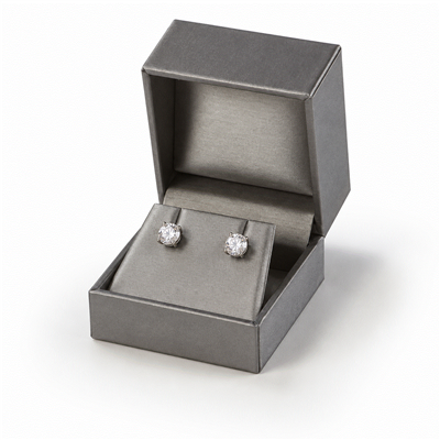 Metallic silver leatherette earring box with stud earrings