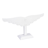 White wing-shaped faux leather earring display stand holding earrings