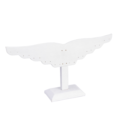 White wing-shaped faux leather earring display stand holding earrings