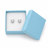 Light blue paper earring box with stud earrings