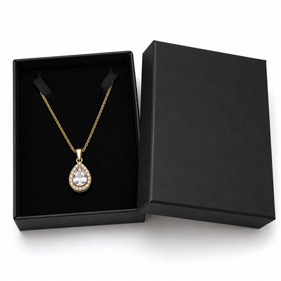 Black cardboard necklace jewelry box with gold pendant necklace