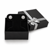 Black earring jewelry box with silver bow and stud earrings