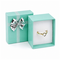 Teal Blue Paper Ring Gift Box with Silver Bow and White Flocked Foam Insert