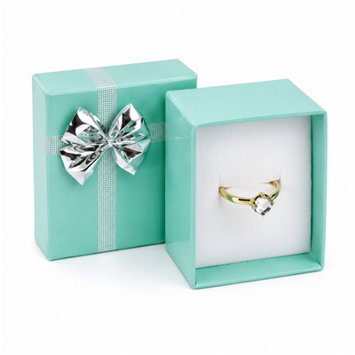 Teal Blue Paper Ring Gift Box with Silver Bow and White Flocked Foam Insert