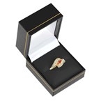 Black leatherette ring box with gold trim and velvet insert